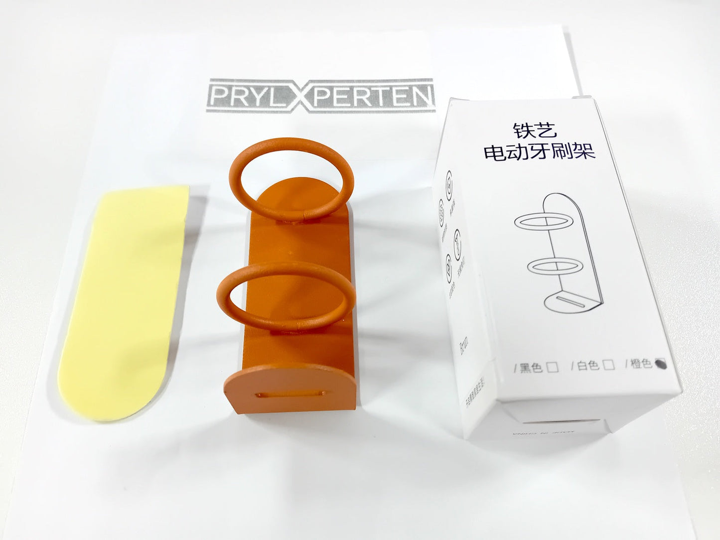 Vägghållare till eltandborsten metall orange Generic