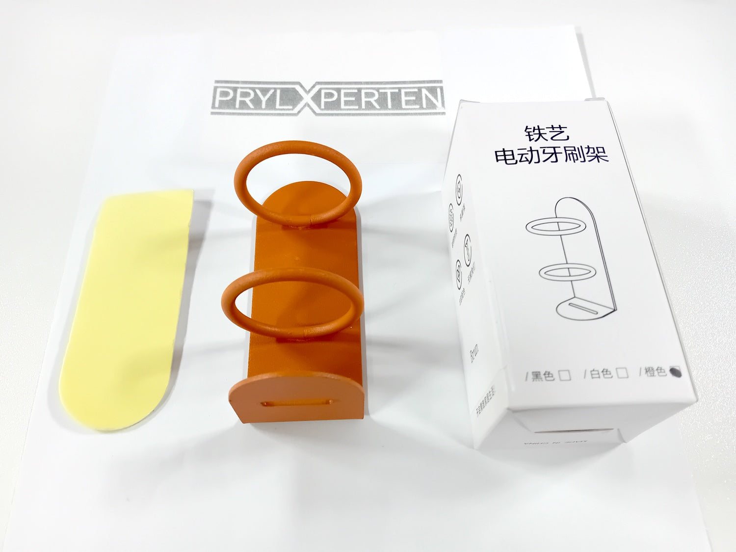 Vägghållare till eltandborsten metall orange Generic